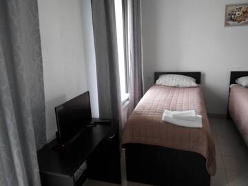 Фото номера Двухместный номер с 2 отдельными кроватями Гостевой дом Mari Hotel г. Мариуполь 3