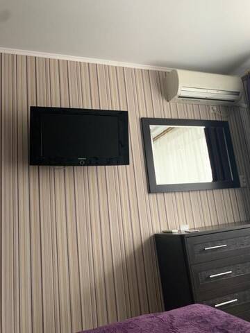 Фото номера Стандартные апартаменты Апартаменты Violet Apartment г. Мариуполь 15